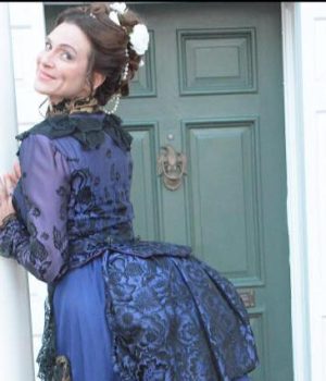 Cindy in costume outside house